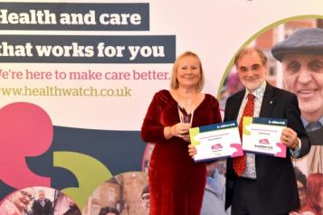 kate holt and dr david n jones with awards