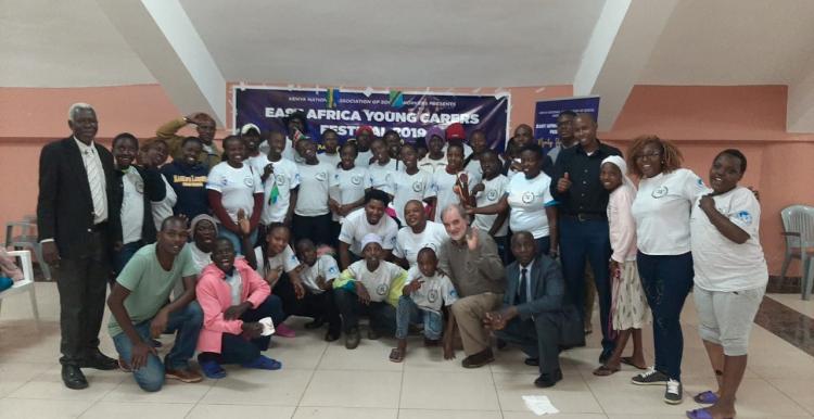 Dr David N Jones with young carers’ in East Africa Young Carers Festival