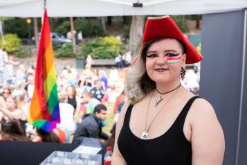 Person celebrating pride with Healthwatch